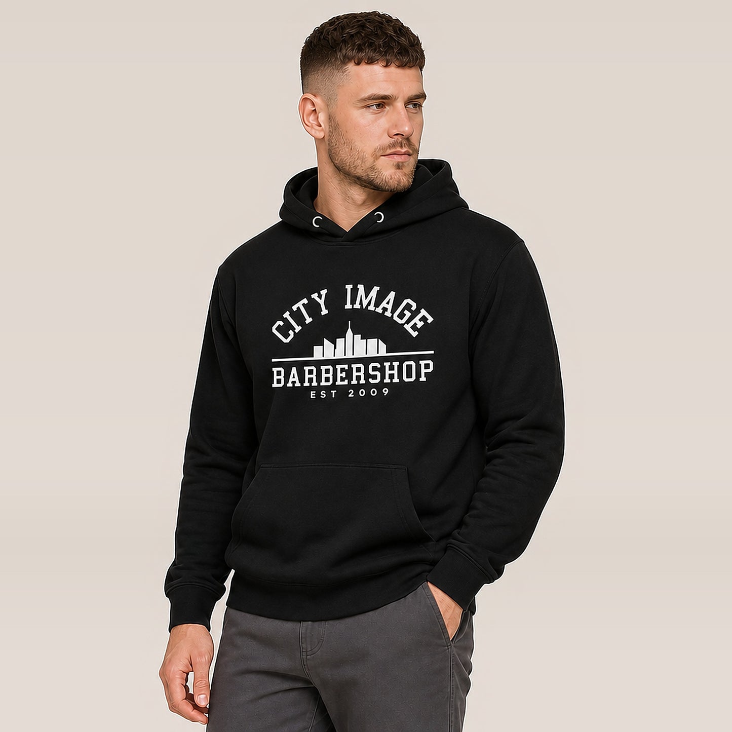 City Image College Hoodie (Black) — on model